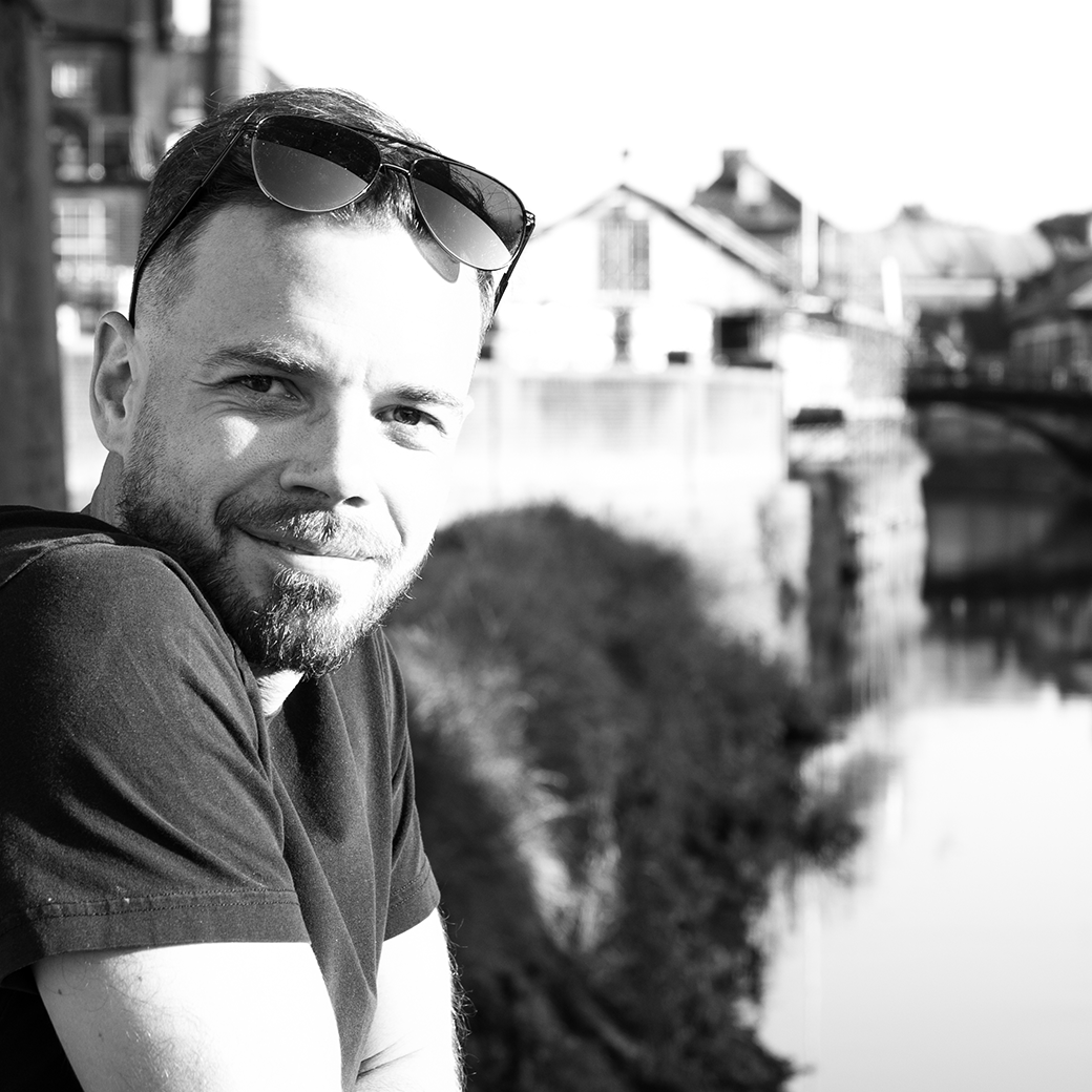 Russ Hepton sitting by the river